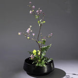 Round ceramic ikebana vase