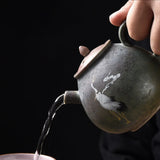 Round Japanese teapot with cranes