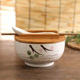 Japanese bowl with chopsticks and spoon