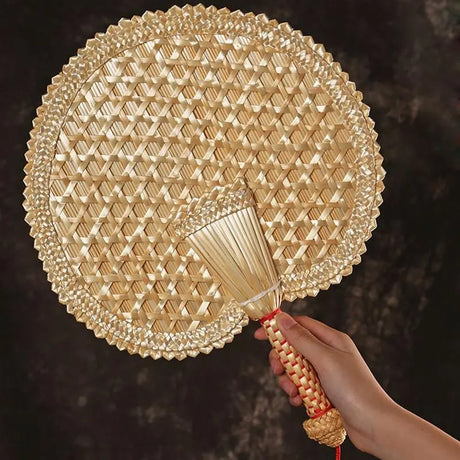 Round Japanese fan in old woven straw