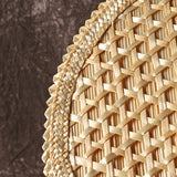 Round Japanese fan in old woven straw
