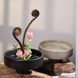 Vase ikebana rond en hauteur