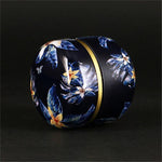 boite-a-the-japonaise-en-metal-ronde-bleu-fonce