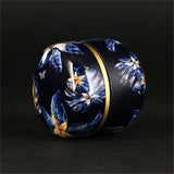 boite-a-the-japonaise-en-metal-ronde-bleu-fonce
